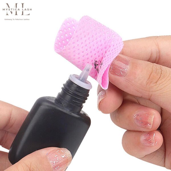 Wipe The Top Of The Glue Bottle With A Pink Cleaning Pad